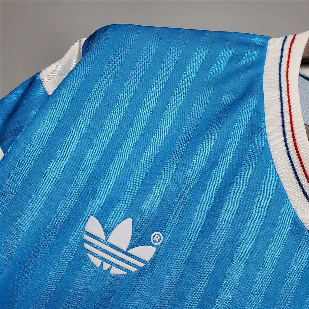 Maillot OM 1990 – Époque Cantona 🔵⚪